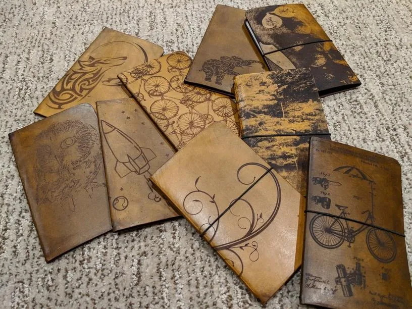 Decorated brown book covers with assorted ornamental patterns